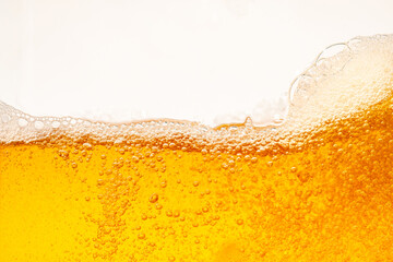 Close up bright orange Oil or beer splash texture and nature waves, Beautiful waves curve and little bubbles smooth for graphic design and background, Oil Bubbles, Soft beer bubbles, Selective focus