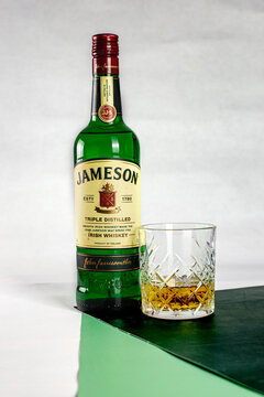 bottle of jameson whiskey on a light background