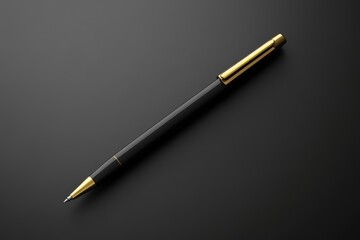 Naklejka premium A sleek black and gold pen resting on a dark surface