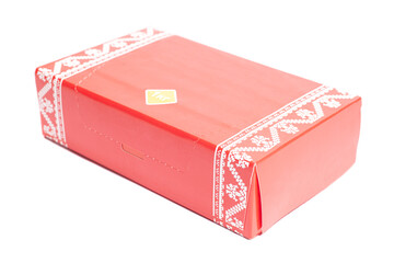 Box with refined sugar isolated on white.