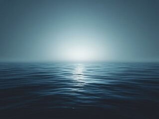 Obraz premium Calm ocean sunrise, misty horizon, peaceful seascape, travel backdrop