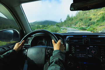 Driving off road car in the high altitude forest mountains © lzf