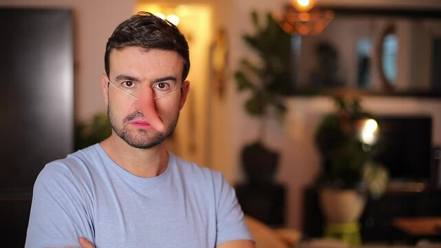 Funny man using a long plastic nose 