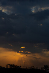 Beautiful sunset in the evening sky with clouds. Nature background.