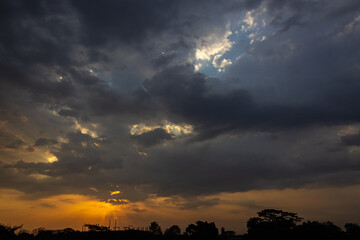Beautiful sunset in the evening sky with clouds. Nature background.