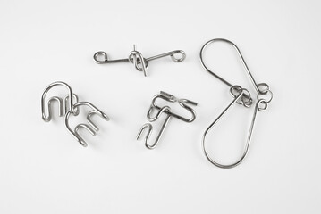 Wire Puzzles (Ring Puzzle) on White Background.