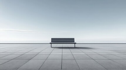 Minimalist outdoor scene featuring a solitary bench on a serene tiled plaza against a clear sky, evoking feelings of solitude and tranquility.