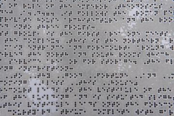 Tactile Braille information board designed for visually impaired individuals