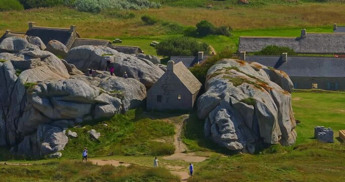 France, Meneham, 26 February 2025: Aerial view of an ancient stone house in the rocks