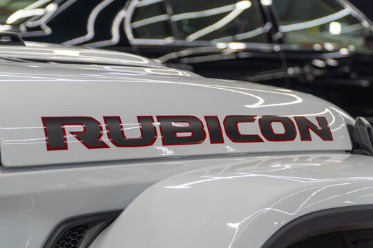 Jeep Rubicon Wrangler Unlimited recon edition logo on the fender. Jeep Rubicon Wrangler Unlimited American off-road us vehicle car is white. American SUV. 