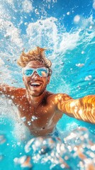 Fototapeta premium A Young Adult Male Swimmer Enjoying a Playful Moment Underwater in Crystal Clear Ocean Water, Captured in a Vibrant, Joyful Selfie