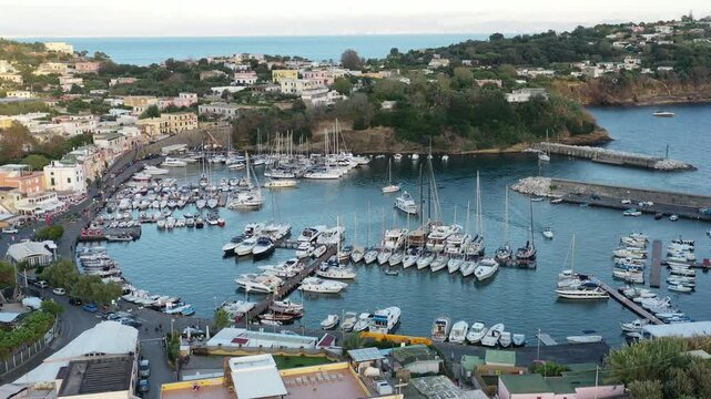 characteristic houses of Procida with tourists and inhabitants - Italy