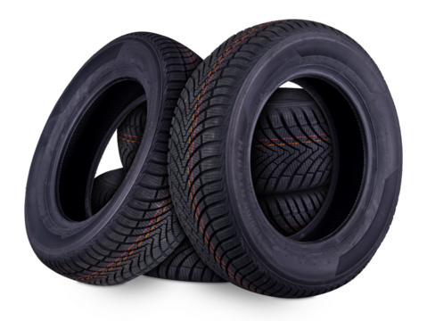 four new all weather season or winter tires car tires stacked isolated  white background. road saftey and transportation service concept