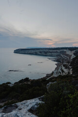 Breathtaking view of a coastal landscape at sunset. Zapallo Bay, Cyprus.