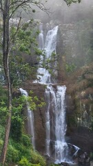 huge waterfall in the Sri Lankan jungle