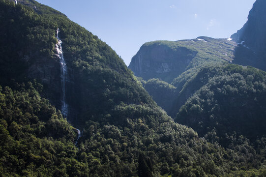 Waterfall scenery in fjord mountains
