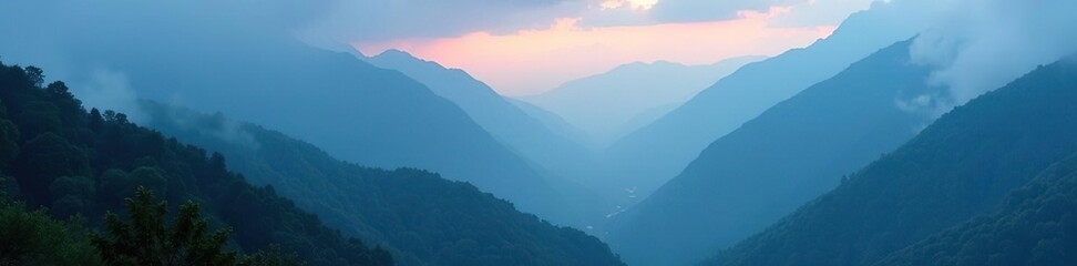 Fototapeta premium Foggy mountainside at dawn with misty peaks and valleys shrouded in an eerie blue haze amidst gentle rain sounds, rain, valley, serene