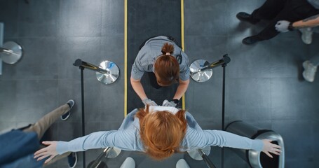 Security Checkpoint in Airport Terminal: Diverse People Walking Through X-ray Metal Detector, Security Officers Inspecting Passengers. Crowd of Travelers during TSA Screening Procedures. Top View.