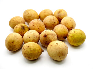 Close-up image of duku fruits (Lansium parasiticum) isolated on a clean white background