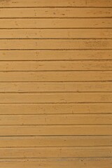 Obraz premium Yellow painted wood plank wall texture background.
