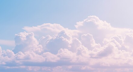 Fototapeta premium Soft pastel clouds floating in a serene sky, creating a tranquil atmosphere