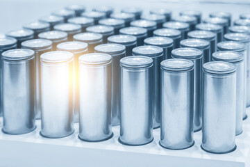 The group of battery pack for electric vehicle car in the light blue scene with lighting effect.