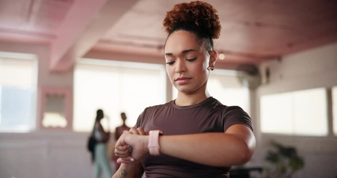 Woman, gym and check fitness on smart watch, cardio statistics and results of workout on app. Exercise, person and monitor health information on website, progress update and tracking target time