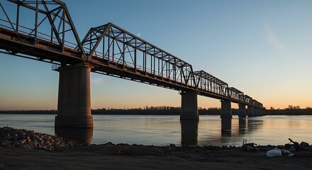 Fototapeta premium Long truss bridge over water - connection and passage - travel and infrastructure content