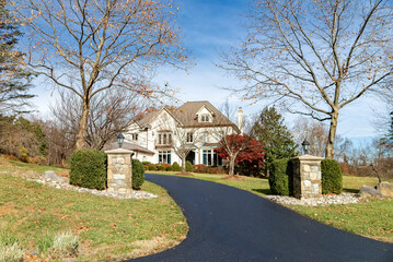 Asphalt driveway to large country house. Washington suburb. The state of Virginia.