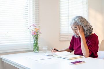  business, savings, annuity insurance, age and people concept - senior woman with papers or bills...