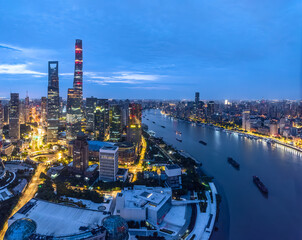 Naklejka premium Aerial panoramic view of Shanghai city skyline at night in China