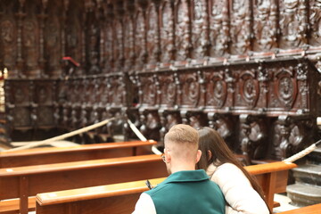 young woman and man on the phone