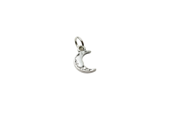 Silver crescent moon pendant with intricate designs hanging on a delicate chain isolated on a clean black background