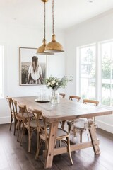 Rustic farmhouse dining room with large wooden table, simple decor and natural light.