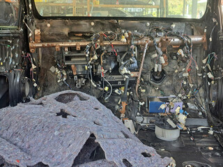 Photo inside the car that repairs internal electrical systems