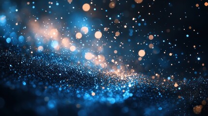 Obraz premium Abstract blue and orange glitter bokeh background.