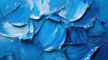 Close-up of vibrant blue oil paint, showcasing rich brushstrokes in an abstract, artistic detail.