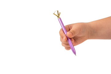 Hand holding purple pen with diamond top on isolated white background. Person gripping stylish purple pen with gem. Writing, elegance, and fashion concept