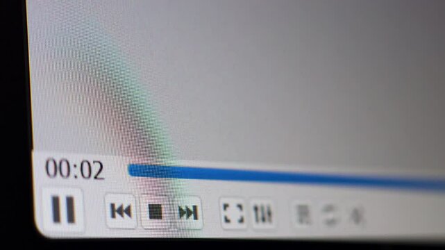 Play button press Video player started Universal counting leader Camera shot of a computer screen
Camera shot of a computer screen. Cursor clicks on PLAY button on video player. Universal counting