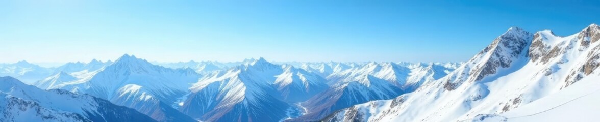 Obraz premium Snow-covered peaks and valleys under a clear blue sky, landscape, expansive
