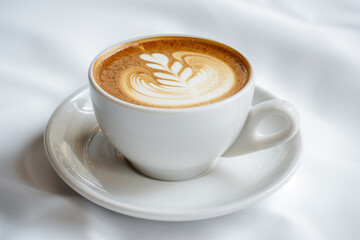cup of cappuccino  on  white background