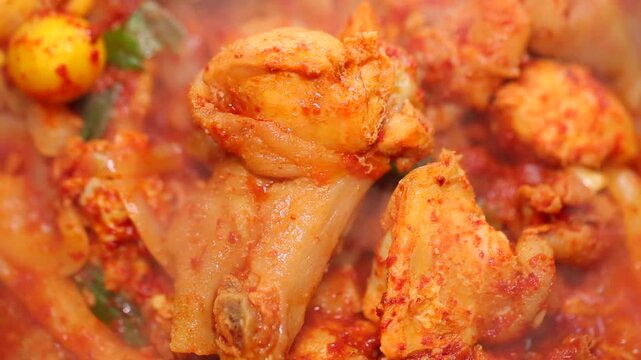 Spicy braised chicken with chicken eggs and ootheca