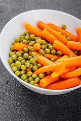 Green peas and carrot canned food tasty fresh delicious gourmet food background table rustic food top view copy space keto and paleo diet vegetarian and vegan food