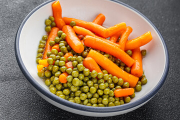 Green peas and carrot canned food tasty fresh delicious gourmet food background table rustic food top view copy space keto and paleo diet vegetarian and vegan food