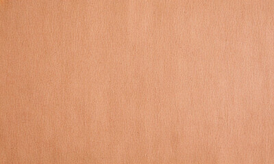 Fototapeta premium Brown kraft paper cardboard sheet texture background with a vintage, natural look. Subtle rough surface, perfect for packaging, scrapbooking, and eco friendly designs.Ideal for wallpaper and backdrop.