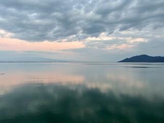 Fototapeta premium reflection on the kerkini lake at sunset