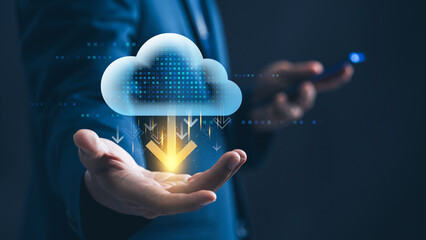 Cloud computing and data management. businessman presents a glowing cloud computing with a download symbol, representing cloud based storage, secure file transfer, and digital business innovation.
