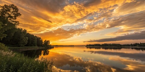 Fototapeta premium Golden Sunset Reflection Landscape Photography Composition, Dramatic Sky, Water, Clouds, Nature Landscape photography, sunset, reflection