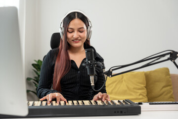 Professional Musician with condenser microphone and tablet for Mixing Mastering music. Music...