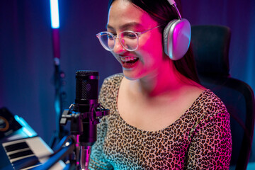 Professional Musician with condenser microphone and tablet for Mixing Mastering music. Music...